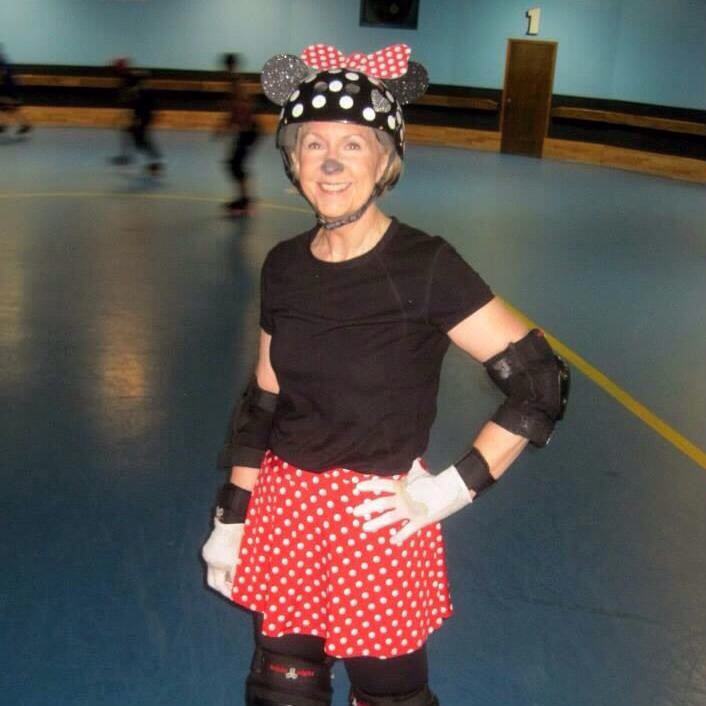 Linda in costume on skates