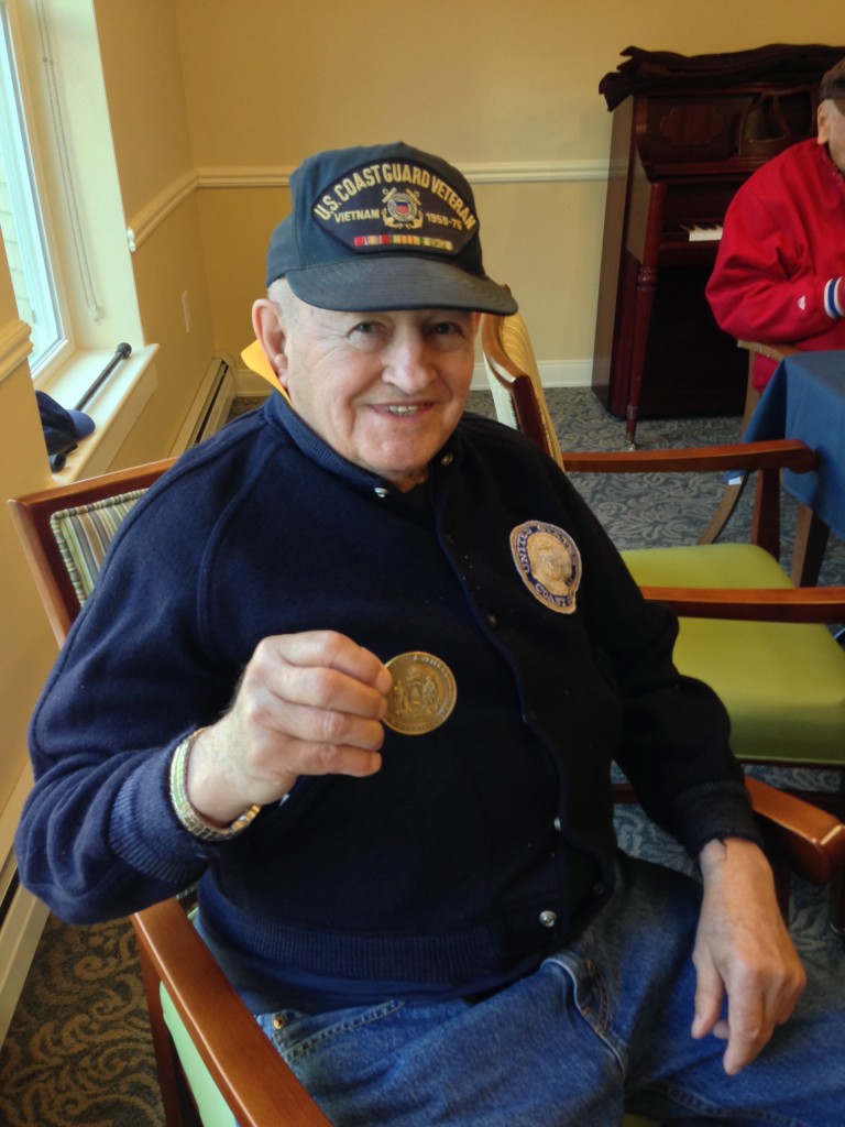 Rodney Drown shows his medal