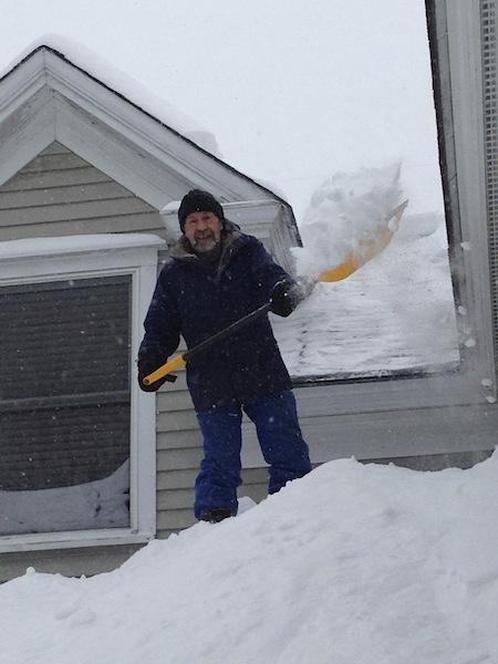My husband shoveling