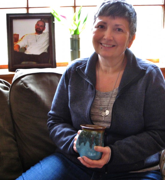 Dawn Stone with picture of her son Tyler