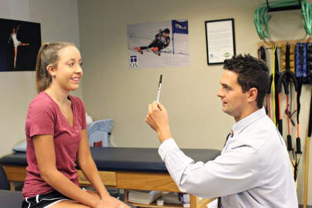 Person with concussion seeing physical therapist