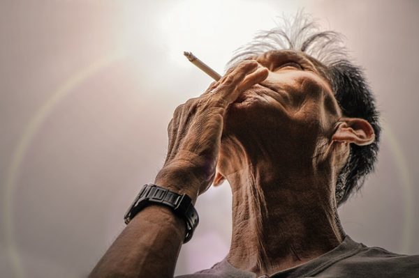 Older man smoking