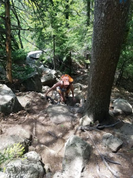 Nicole Petit climbing Tumbledown Mountain