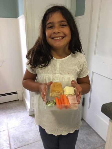 Ramona holding her Lovables school lunch