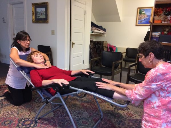 Diane getting a Reiki treatment