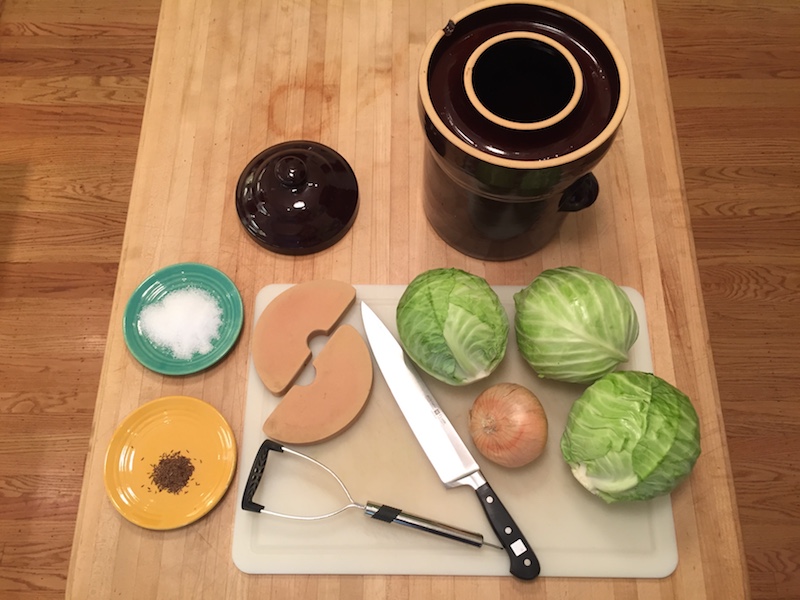 Ingredients and equipment for making sauerkraut