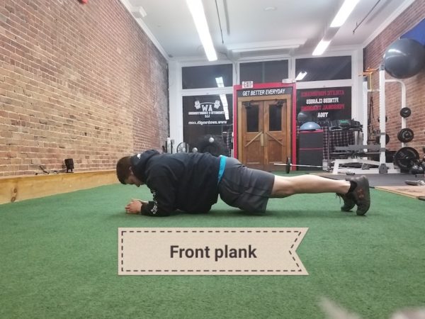 Andy demonstrates plank