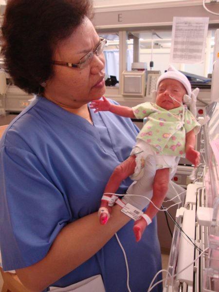 Nurse with Jen's newborn daughter