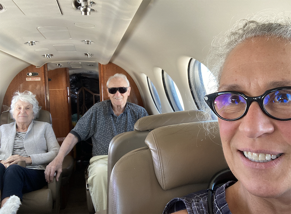 Jodie and her parents on the private plane that brought them to Maine