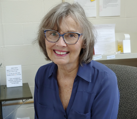 Diane at library desk