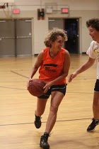 Susan Pillsbury playing basketball over 50 in Maine