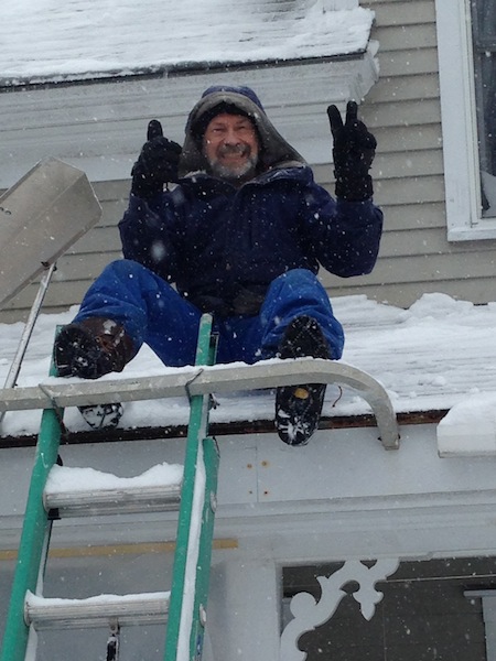 Barry Atwood on snowy roof, after shoveling