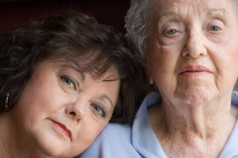 Elderly woman and daughter