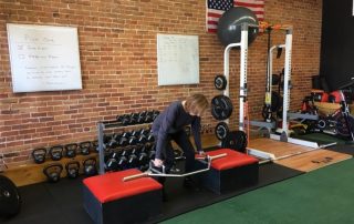 Diane Atwood doing trap bar deadlift