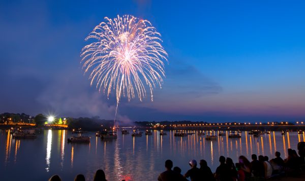 Fireworks over a river