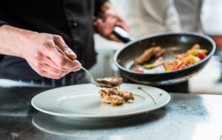 Chef plating food