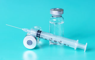 Syringe and vials