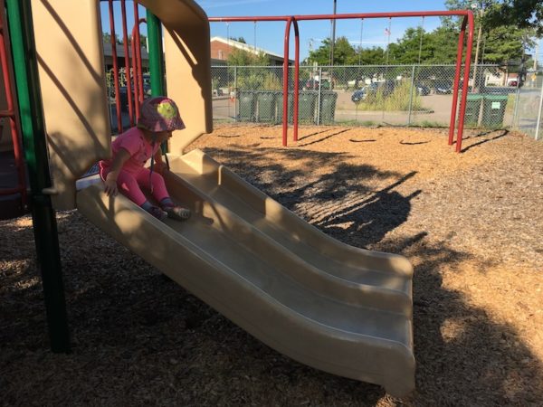 Granddaughter down the slide