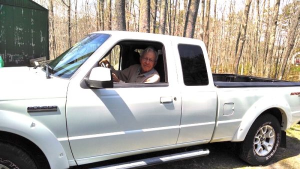 Bill Taylor driving his truck