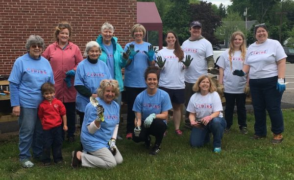 volunteers at multigenerational garden in Saco, Maine