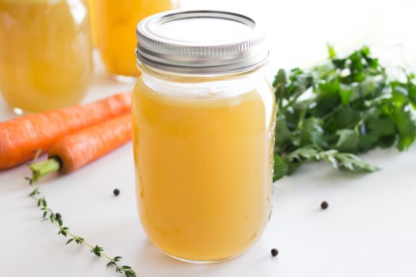 Jar of homemade chicken stock