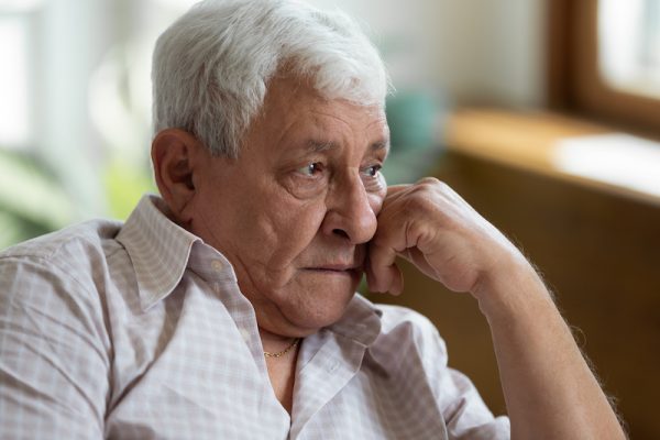 Sad looking older man/Adobe stock image