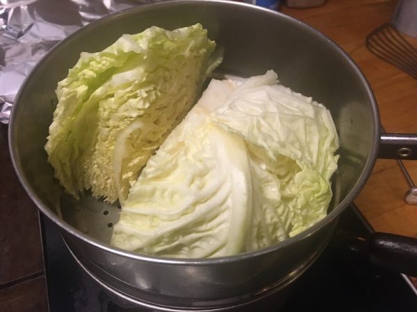 Cabbage wedges in a steamer