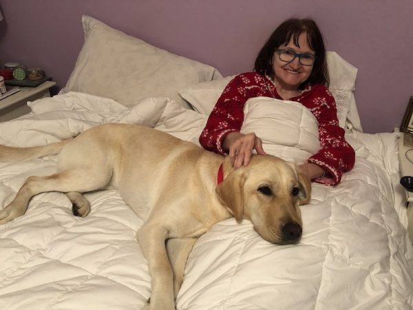 Kathy McInnis-Misenor and her NEADS service dog Sandy