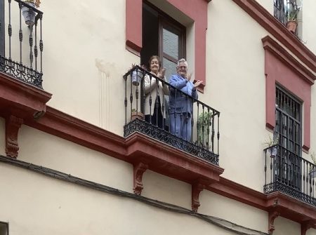 Spanish balcony with people clapping