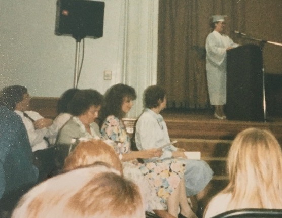 Rhonda speaking at graduation