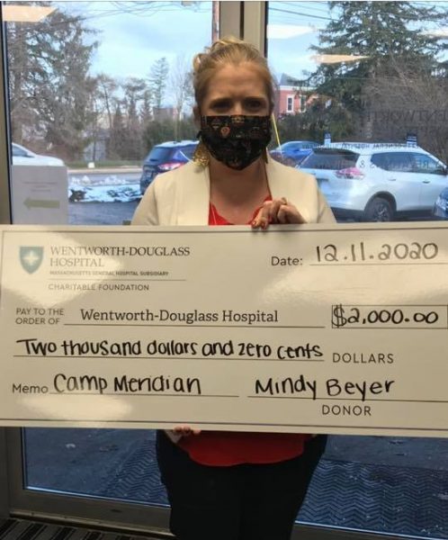 Mindy Beyer with check