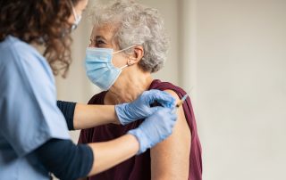 Person getting COVID vaccine