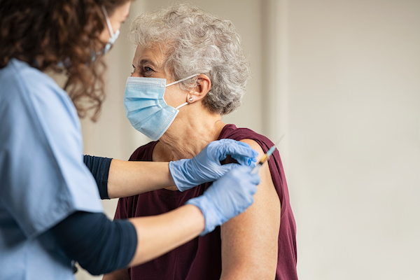 Person getting COVID vaccine