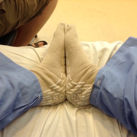 Amy Stacy Curtis's feet in hospital socks