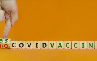 Blocks spelling out COVID vaccine, yes or no
