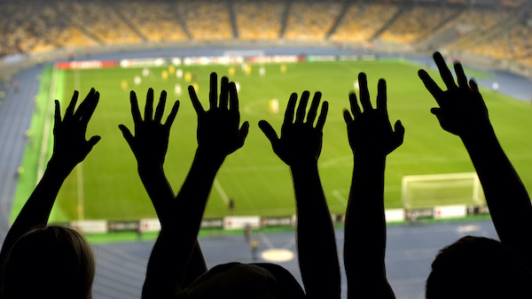 Hands waving, sports event