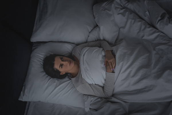 Awake women in bed/sleep disorder