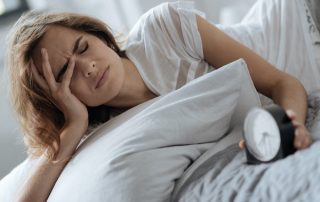 Woman awake in bed/sleep disorder